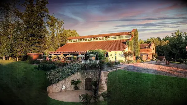 View of Italian-inspired wedding venue and cute garden