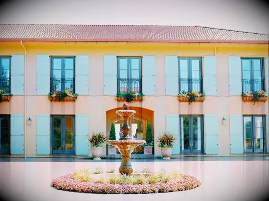Colorful wedding venue with an outdoor fountain