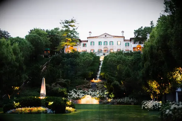 Garden view of charming wedding venue on a hill