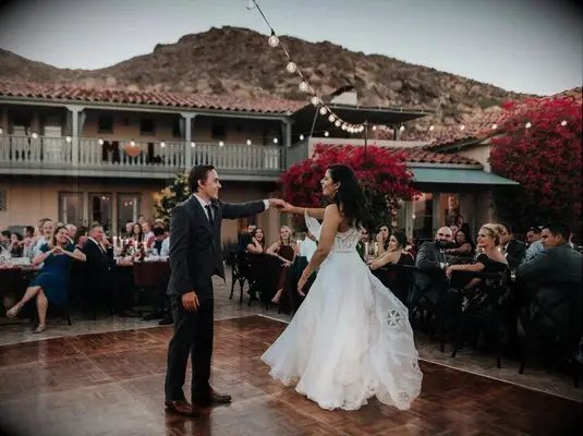 Couple dancing at outdoor wedding