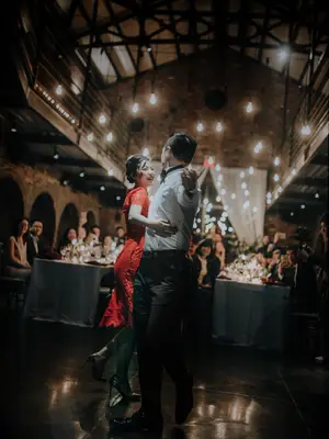Bride and groom during first dance song at wedding reception