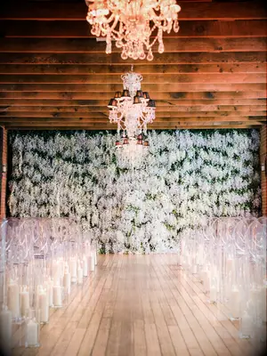 Gorgeous flower wall at a wedding ceremony. 