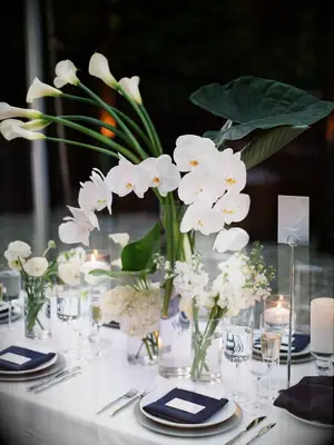 Modern tablescape with calla lilies and orchids