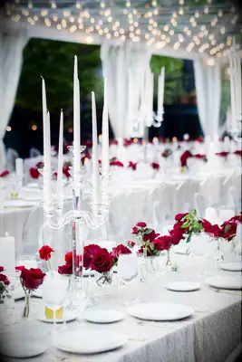 Red rose and candelabra centerpieces for your romantic Disney-themed wedding