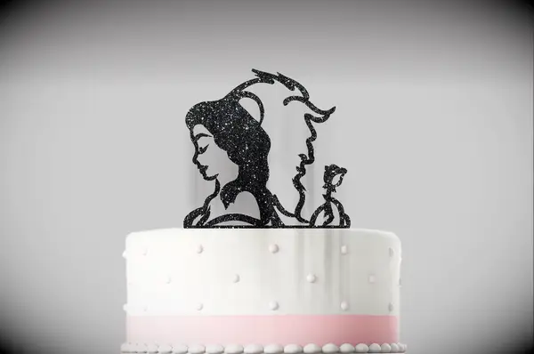 Black silhouette wedding cake topper of Belle and the Beast from SimplyAcrylicDesign