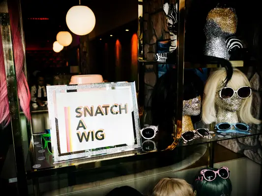 Retro wig station, wedding photo booth idea. 