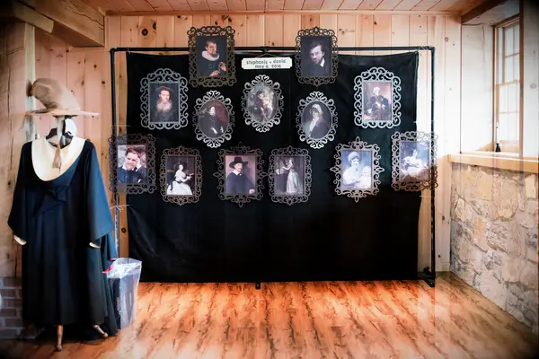 Harry Potter-themed photo booth with robes and hats