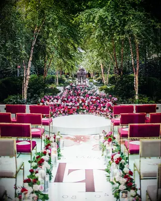 Floral aisle runner with cusom initals and dates. 