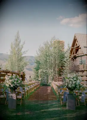 Rustic ourdoor aisle on a mountain ranch. 