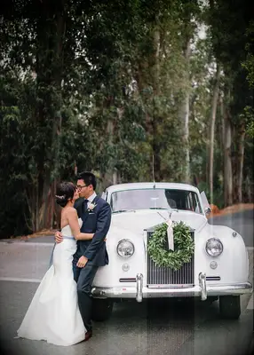 1960s Silver Cloud Rolls Royce with wedding car decorations