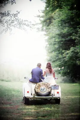 Burlap flags on wedding car