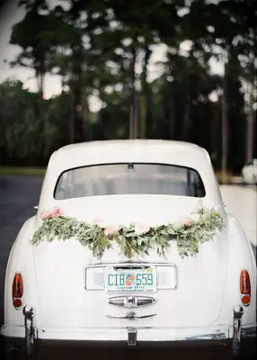 Getaway car with roses and eucalyptus