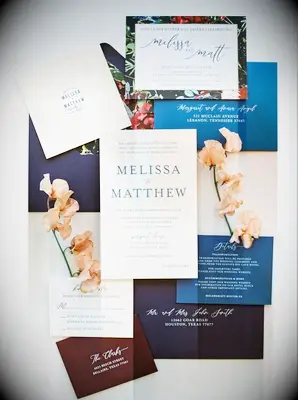 Invitation flatly styled with sweet pea blooms