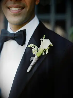 Boutonniere with calla lily and lilies of the valley