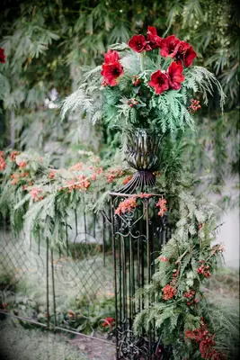 Amaryllis arrangement on pedestal