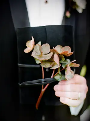 Hellebore blooms on vow book