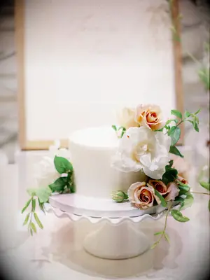 elegant one tier wedding cake with white and blush roses 