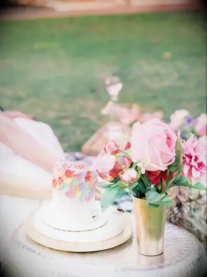 unique one tier wedding cake with colorful paintbrush stroke accents