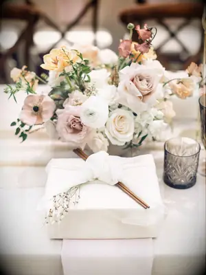 Earth-Tone Spring Centerpiece with Roses and Anemones
