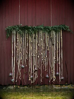 Knotted rope for a reception backdrop to symbolize tie the knot meaning. 