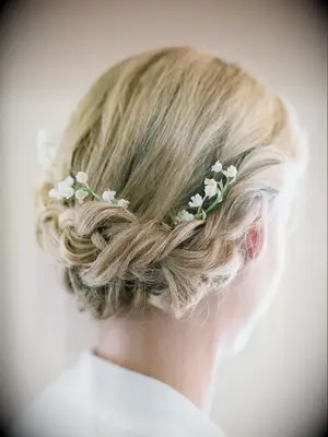 wedding updo with fresh lily of the valley flowers