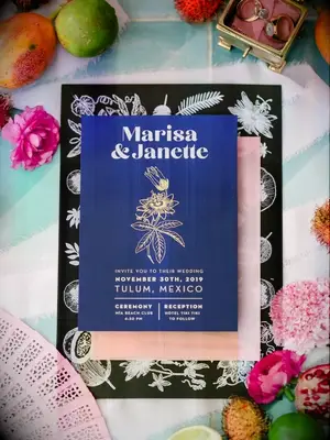blue wedding invitation with illustrated passion flower
