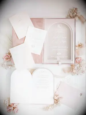 modern wedding invitation suite with clear acrylic invitation and insert cards in a blush pink box