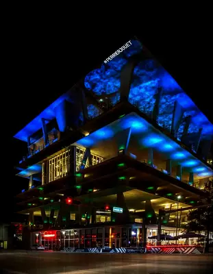 Large downtown parking garage with neon lights at unique 1111 Lincoln Road wedding venue in Miami, Florida