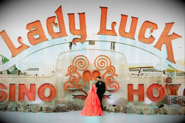 Couple in front of unique Neon Museum wedding venue in Las Vegas, Nevada