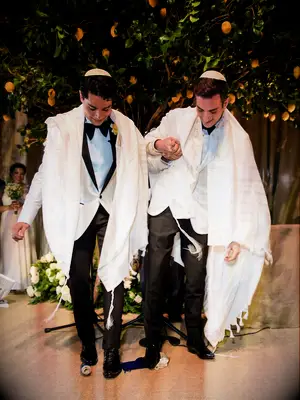 Grooms breaking glass in traditional Jewish wedding ceremony timeline.
