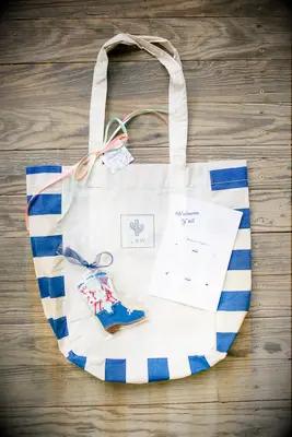 Personalized gift bag with a colorful blue print. 