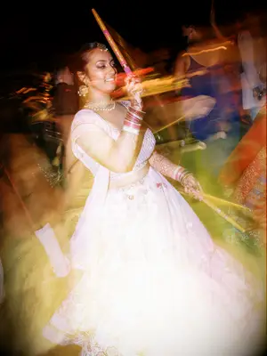 Blurred photography image of woman dancing at wedding ceremony