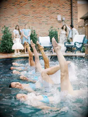 Synchronized swimmers at a summer wedding.