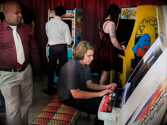 Vintage arcade area at a wedding reception.