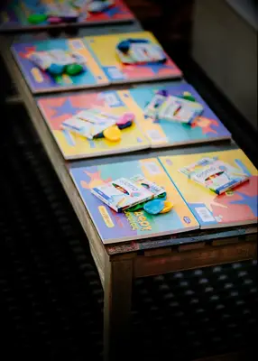 Kids coloring book station at wedding reception