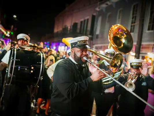Mardi Gras-inspired musical parade at wedding reception