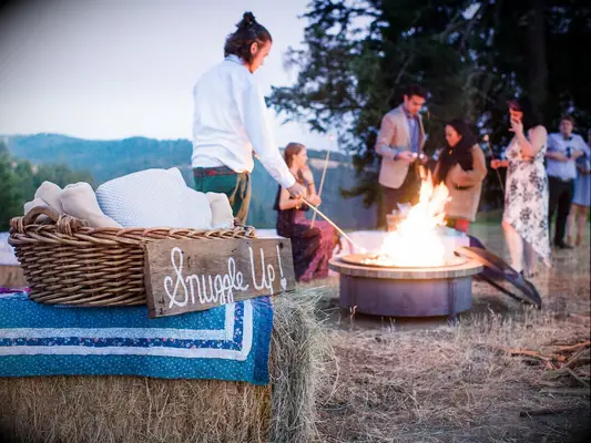 Cozy bonfire at wedding reception