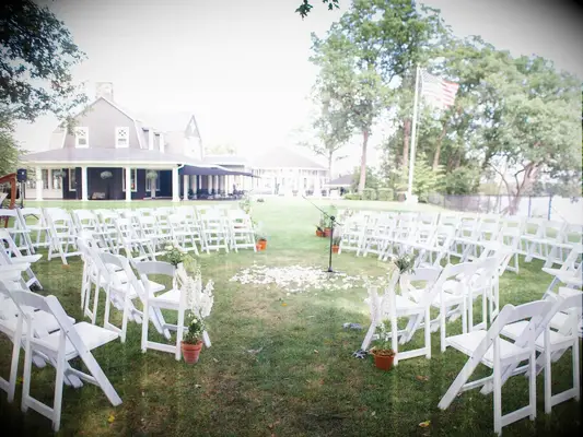 Circular seating arrangement at a backyard wedding