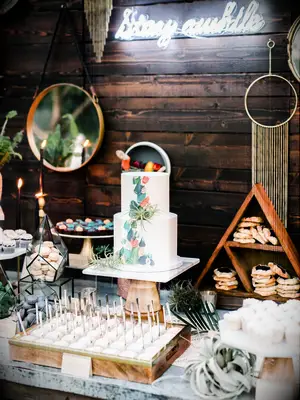 Geometric dessert table at backyard wedding