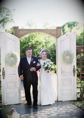 Door entrance at backyard wedding ceremony
