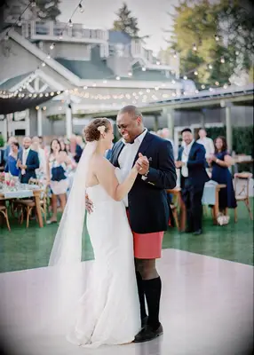 Outdoor dance floor at backyard wedding