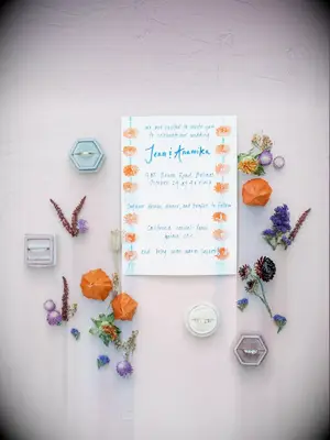 Purple and orange wedding invitation suite 