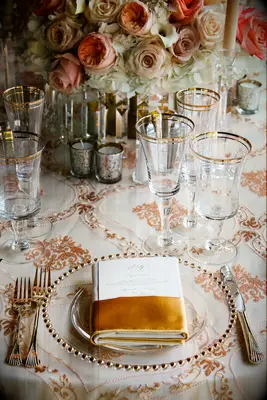 Amber gold and salmon wedding reception decor