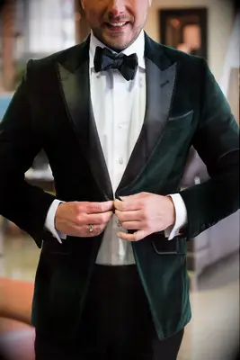 Emerald green and black wedding attire