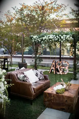 A rustic brown-toned wedding reception space