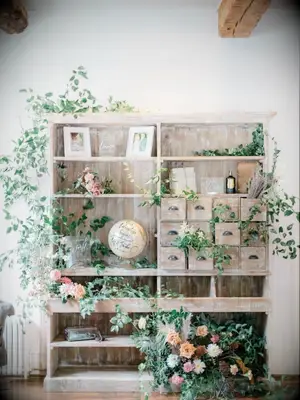 wood armoire with framed photos