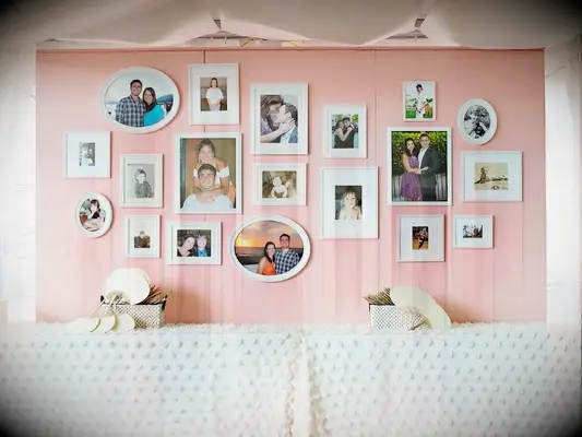 pink-and-white photo display wall