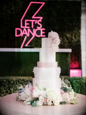 Pastel pink and white wedding tiered cake