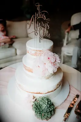 Three tiered naked wedding cake