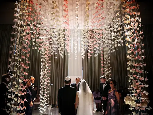 Paper crane chuppah at Jewish wedding